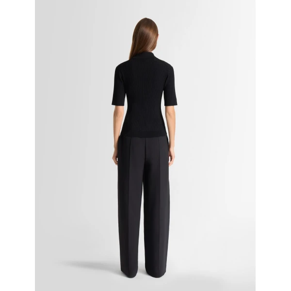 Fusalp Vera Short-Sleeve Polo Shirt in Black, view 4 | Short Sleeved | Coveti