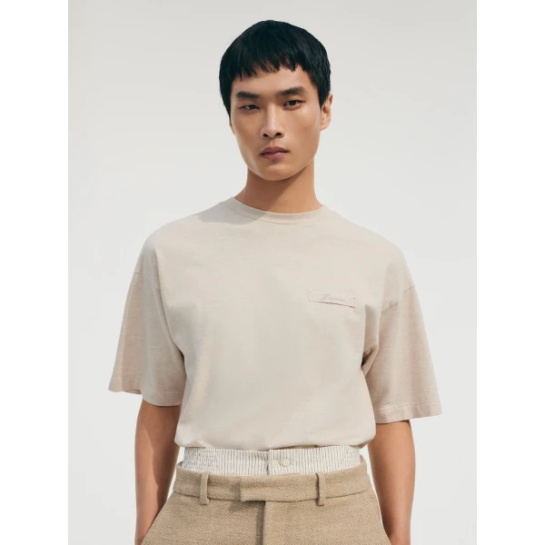 beige top