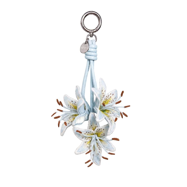 JW PEI 3D Embroidered Lily Bag Charm in Ice Blue | Bag Charms | Coveti