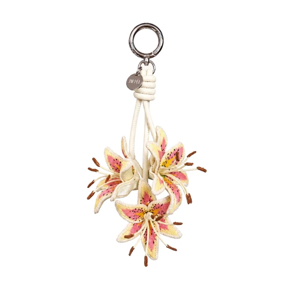 JW PEI 3D Embroidered Lily Bag Charm in Pink Yellow | Bag Charms | Coveti