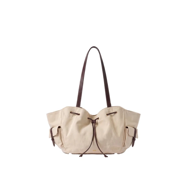 JW PEI Corinne Canvas Drawstring Tote Bag in Beige | Totes & Top-Handle Bags | Coveti