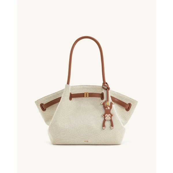 JW PEI Hanging Monkey Bag Charm in Brown | Bag Charms | Coveti