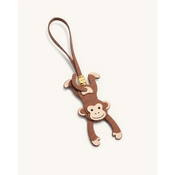 JW PEI Hanging Monkey Bag Charm in Brown | Bag Charms | Coveti
