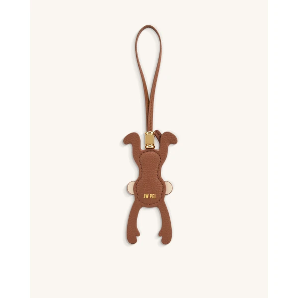 JW PEI Hanging Monkey Bag Charm in Brown | Bag Charms | Coveti