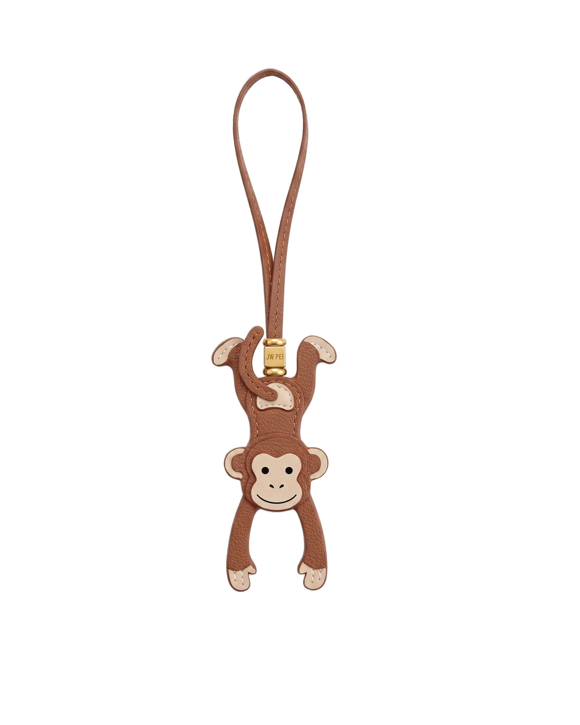 JW PEI Hanging Monkey Bag Charm in Brown JW PEI Hanging Monkey Bag Charm in Brown | Bag Charms | Coveti