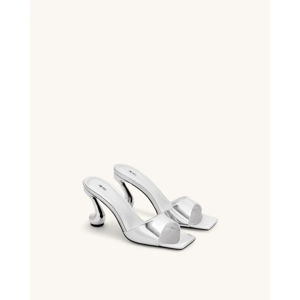 JW PEI Hannah Metallic Faux Vegan Leather Mule Heels in Silver | Mules | Coveti