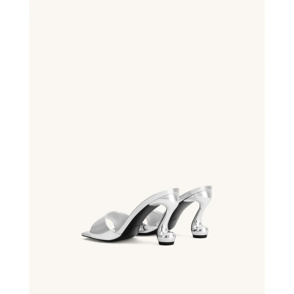 JW PEI Hannah Metallic Faux Vegan Leather Mule Heels in Silver | Mules | Coveti
