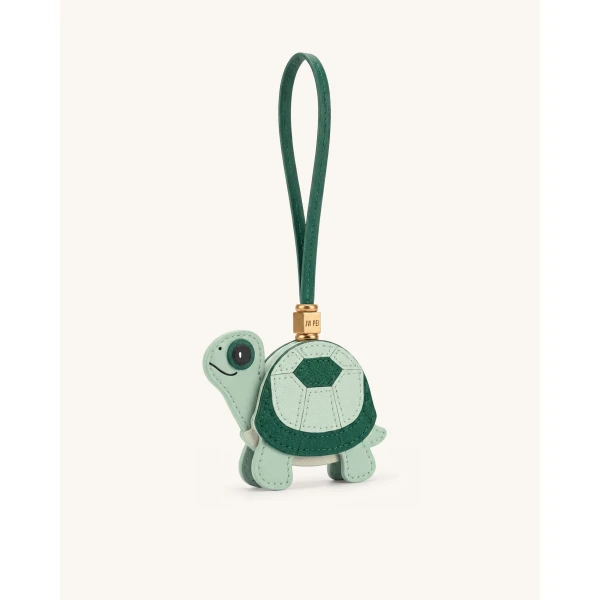 JW PEI Little Turtle Bag Charm in Green | Bag Charms | Coveti