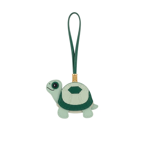 JW PEI Little Turtle Bag Charm in Green | Bag Charms | Coveti