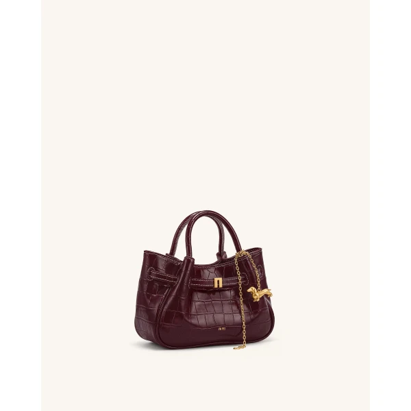 JW PEI Maeve Dachshund Charm Mini Satchel Bag in Burgundy Croc | Mini Bags | Coveti