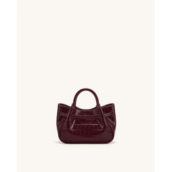 JW PEI Maeve Dachshund Charm Mini Satchel Bag in Burgundy Croc | Mini Bags | Coveti