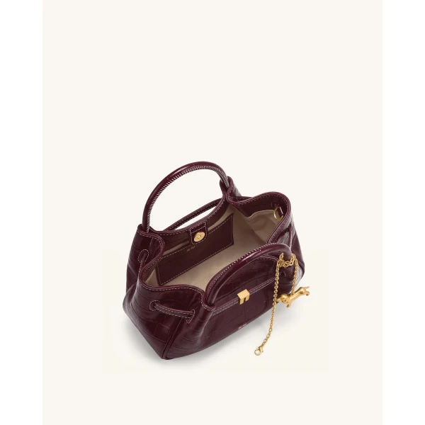 JW PEI Maeve Dachshund Charm Mini Satchel Bag in Burgundy Croc | Mini Bags | Coveti