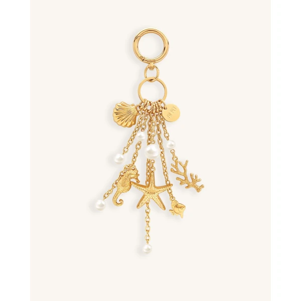 JW PEI Ocean Creature Faux Pearl Bag Charm in Gold | Bag Charms | Coveti