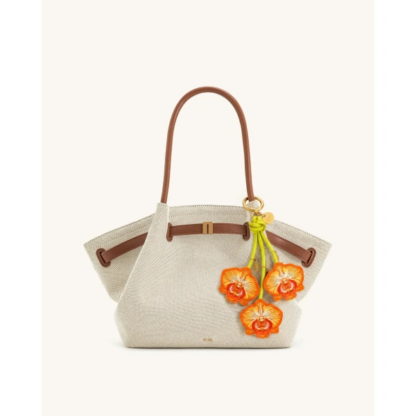 JW PEI Orchid Bag Charm in Bright Orange | Bag Charms | Coveti