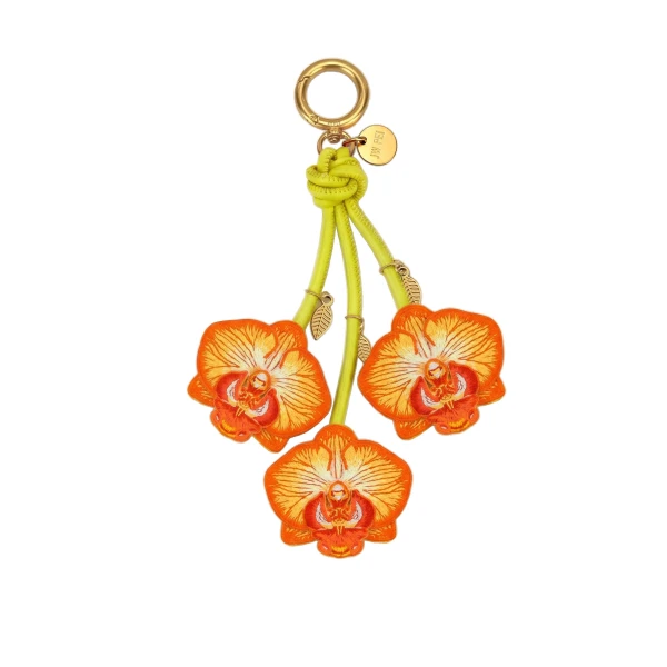 JW PEI Orchid Bag Charm in Bright Orange | Bag Charms | Coveti