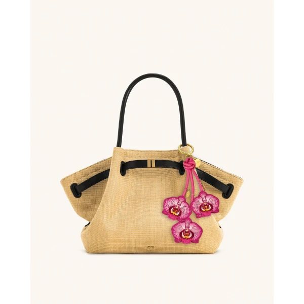 JW PEI Orchid Bag Charm in Pink | Bag Charms | Coveti