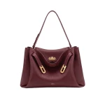 JW PEI Rhea Large Pebbled Double Buckle Shoulder Bag in Claret | Shoulder & Crossbody Bags | Coveti
