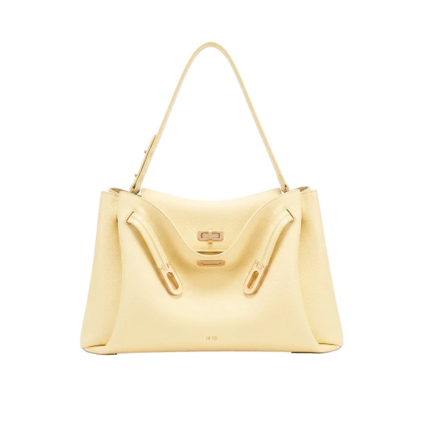 JW PEI Rhea Large Pebbled Double Buckle Shoulder Bag in Creamy Yellow | Shoulder & Crossbody Bags | Coveti