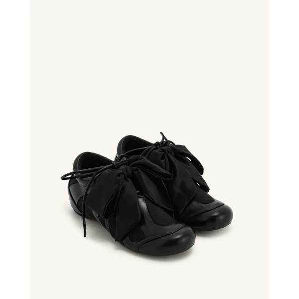 JW PEI Rosie Bow Tie Low Top Sneakers in Black | Sneakers | Coveti