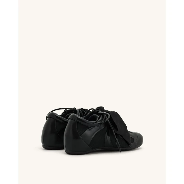 JW PEI Rosie Bow Tie Low Top Sneakers in Black | Sneakers | Coveti