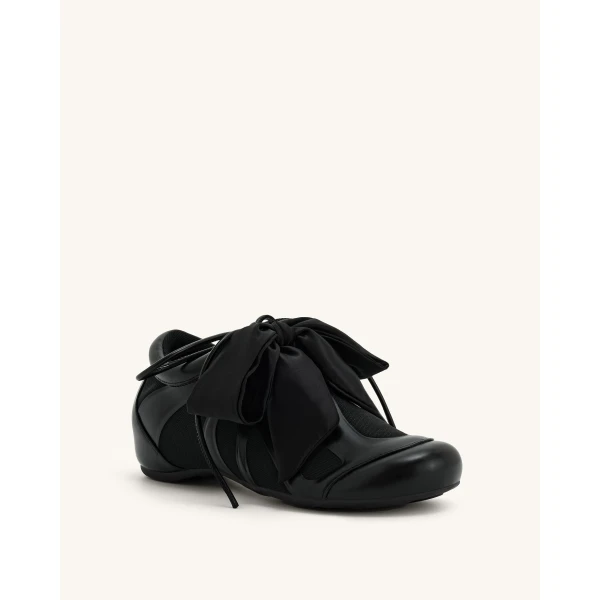 JW PEI Rosie Bow Tie Low Top Sneakers in Black | Sneakers | Coveti