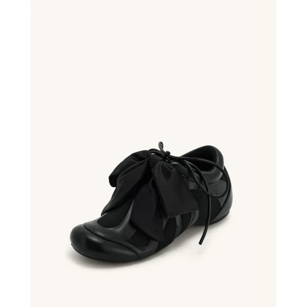 JW PEI Rosie Bow Tie Low Top Sneakers in Black | Sneakers | Coveti