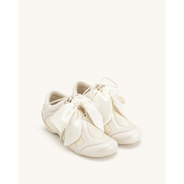 JW PEI Rosie Bow Tie Low Top Sneakers in White | Sneakers | Coveti