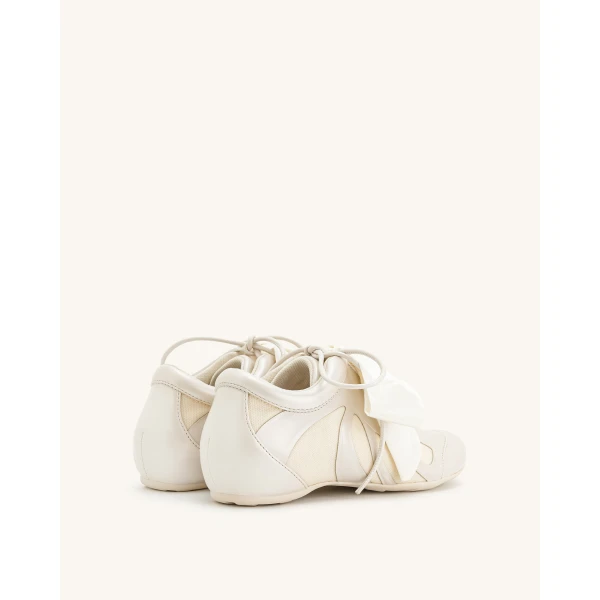 JW PEI Rosie Bow Tie Low Top Sneakers in White | Sneakers | Coveti