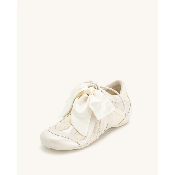 JW PEI Rosie Bow Tie Low Top Sneakers in White | Sneakers | Coveti