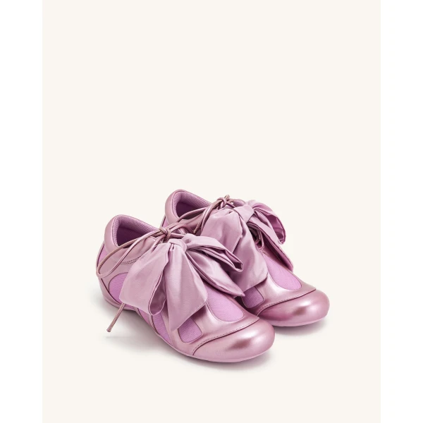 JW PEI Rosie Metallic Bow Tie Low Top Sneakers in Pink | Sneakers | Coveti