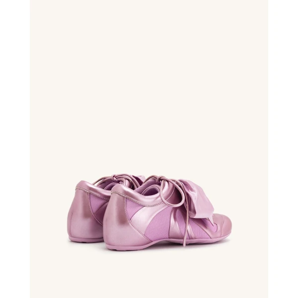 JW PEI Rosie Metallic Bow Tie Low Top Sneakers in Pink | Sneakers | Coveti