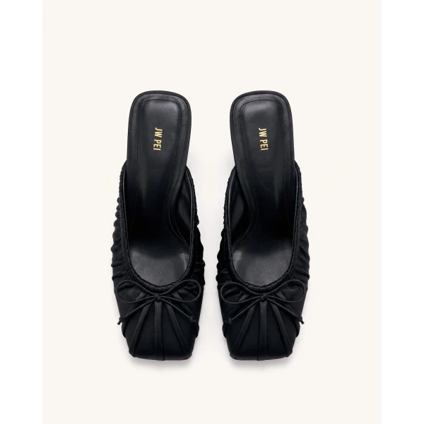 JW PEI Solenne Satin Bow Ruched Mules in Black | Mules | Coveti