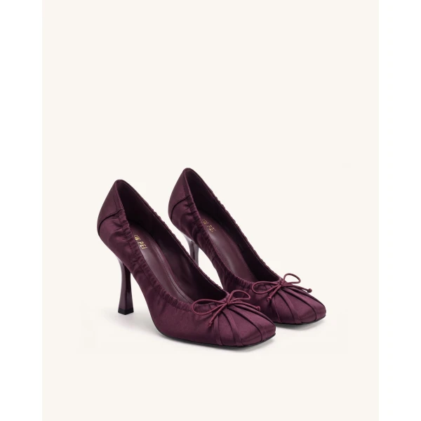 JW PEI Solenne Satin Bow Ruched Pumps in Burgundy | Heels | Coveti