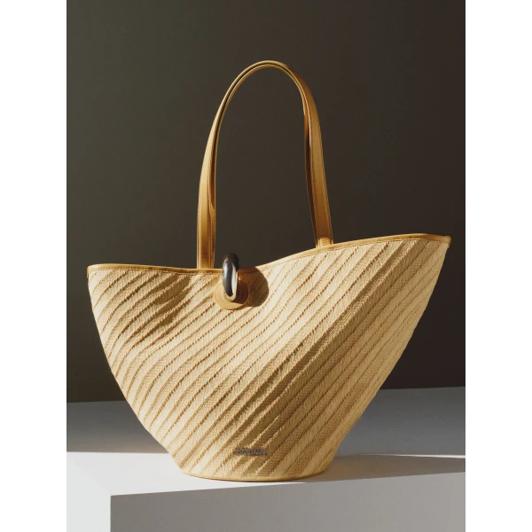 light yellow Jacquemus bucket bag