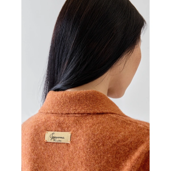 Jacquemus The Cachemire Polo Shirt in Terracotta | Tops | Coveti