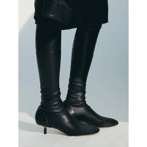 Jacquemus The Collant Boots in Black | Knee-High Boots | Coveti