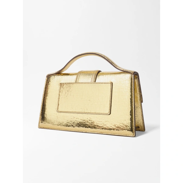 Jacquemus The Large Bambino Bag in Gold | Shoulder & Crossbody Bags | Coveti