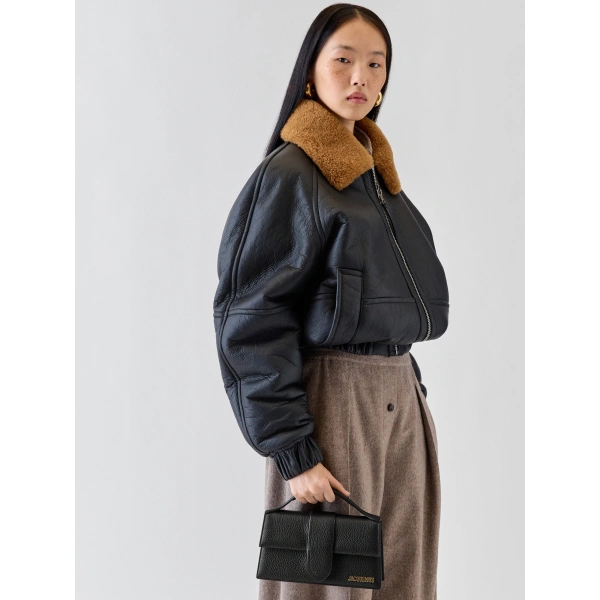 Jacquemus The Large Bambino Grained Bag in Black | Shoulder & Crossbody Bags | Coveti