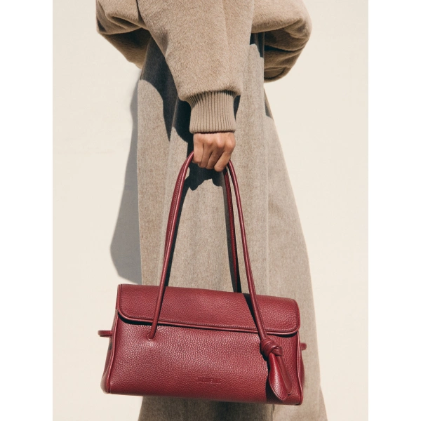Jacquemus The Long Turismo Bag in Burgundy | Shoulder & Crossbody Bags | Coveti