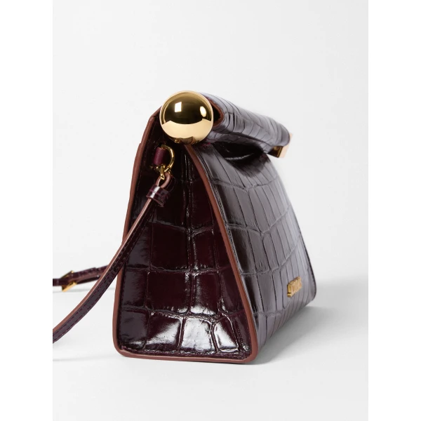 dark burgundy Jacquemus clutch