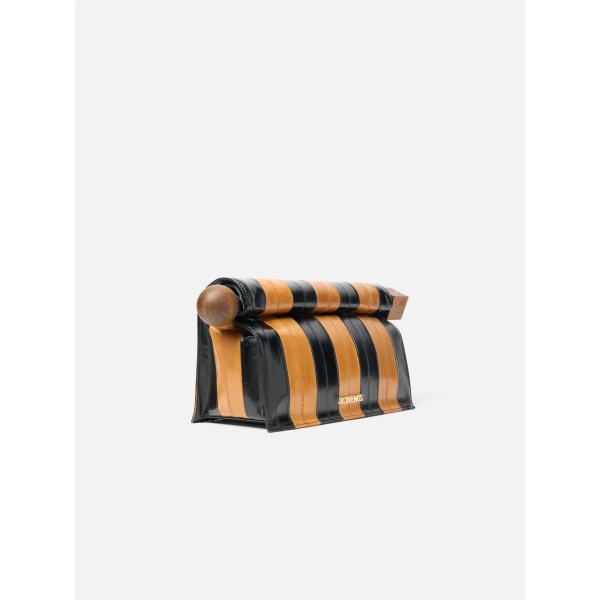 beige and black Jacquemus clutch
