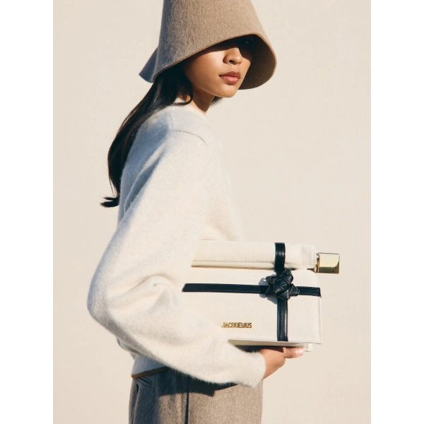 Jacquemus The Rond Carre Clutch in Natural and Black Knot | Clutch Bags | Coveti
