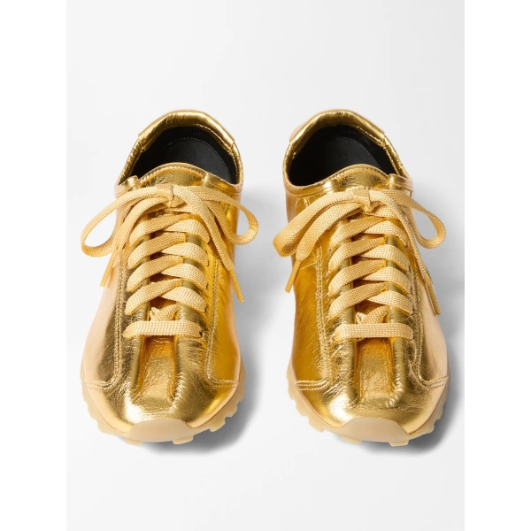 Jacquemus The Tennis Sneakers in Gold | Sneakers | Coveti