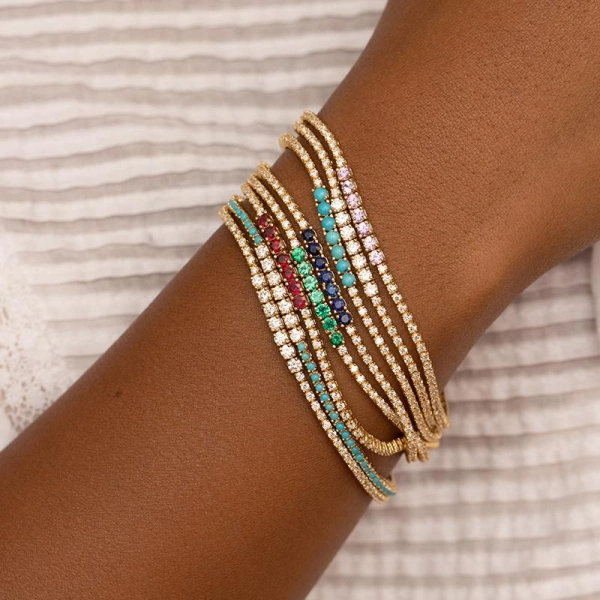 Jennifer Meyer 4 Prong Diamond Tennis Bracelet with Large Emerald Accent in 18K Yellow Gold | Fine Bracelets | Coveti