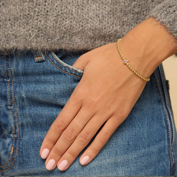 Jennifer Meyer Bezel Tennis Bracelet With Illusion Set Pink Sapphire Center in 18K Yellow Gold | Fine Bracelets | Coveti