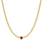 Jennifer Meyer Bezel Tennis Necklace With Illusion Set Ruby Center in 18K Yellow Gold | Fine Necklaces | Coveti