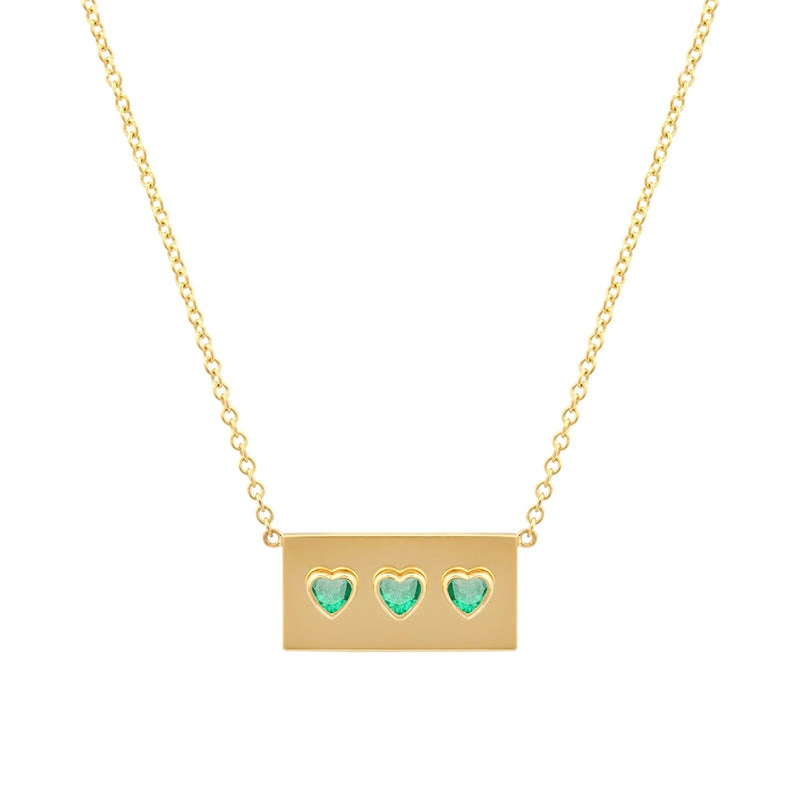 Jennifer Meyer Ellen Plate with 3 Heart Cut Emerald Detail Necklace in 14K Yellow Gold Jennifer Meyer Ellen Plate with 3 Heart Cut Emerald Detail Necklace in 14K Yellow Gold | Fine Necklaces | Coveti