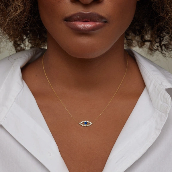 Jennifer Meyer Medium Diamond Open Evil Eye Necklace with Blue Sapphire Center in 14K Yellow Gold | Fine Necklaces | Coveti
