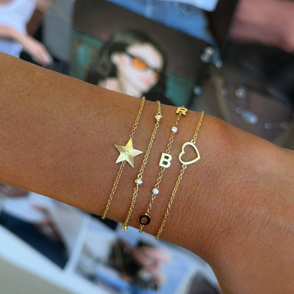 Jennifer Meyer Mini 70's Star Bracelet in 18K Yellow Gold | Fine Bracelets | Coveti