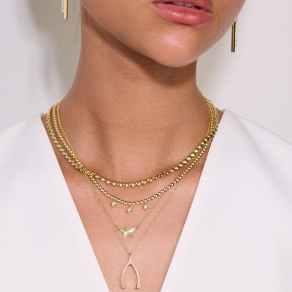 Jennifer Meyer Mini 70's Star Necklace in 18K Yellow Gold | Fine Necklaces | Coveti